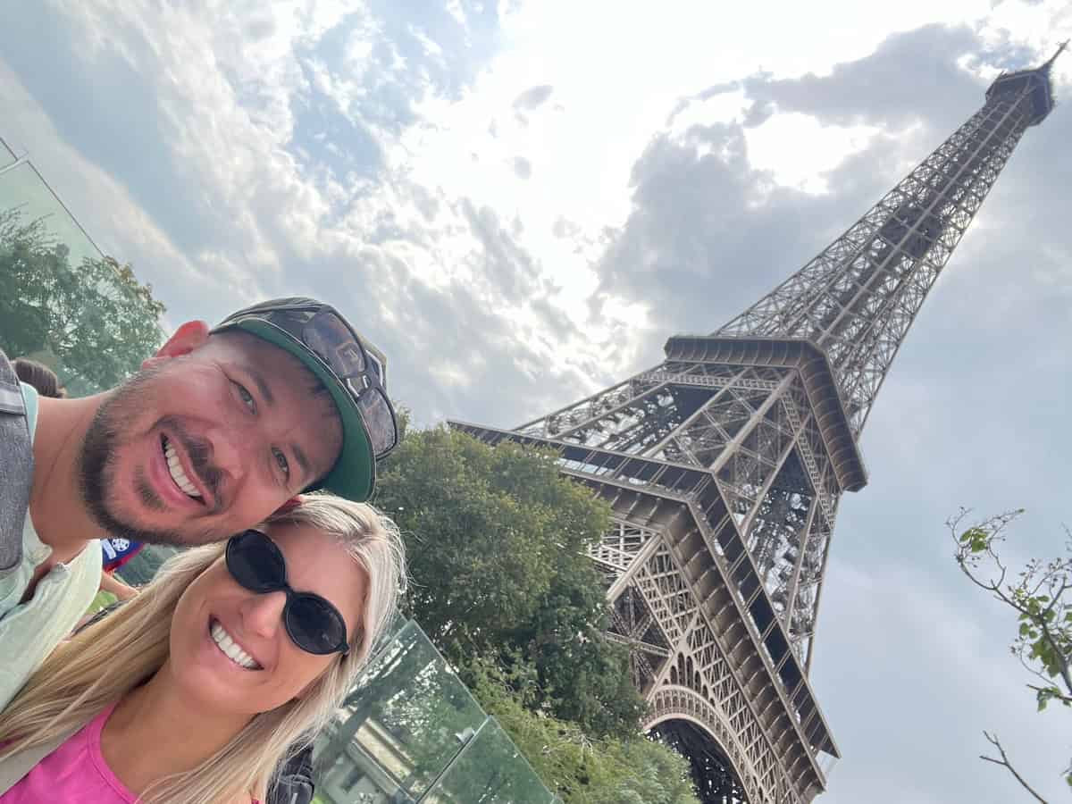Eiffel Tower and friends enjoying a sunny day in Paris.