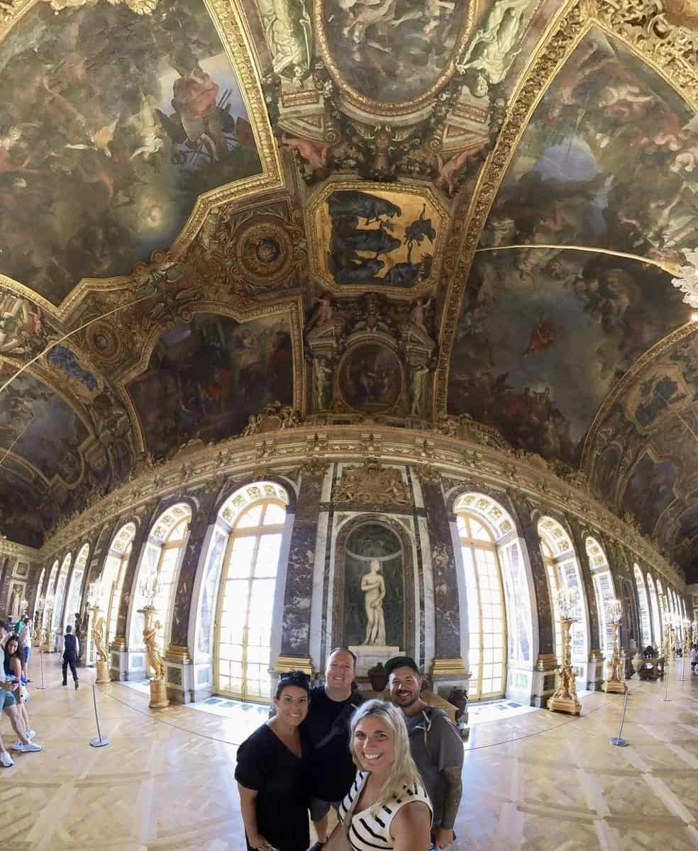 Paris romantic activities: stunning palace interior with ornate ceilings and large windows.