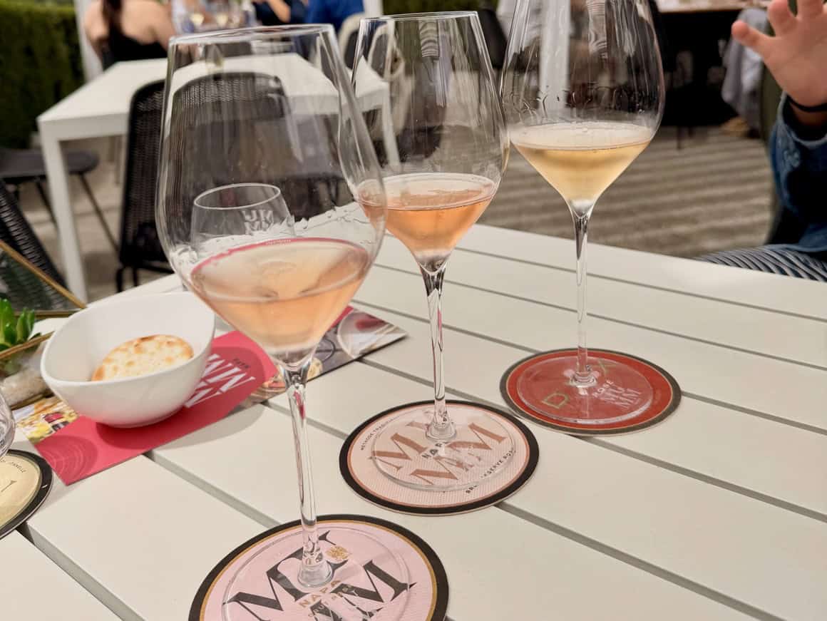 Three glasses of rosé wine on a table at a Napa Valley winery.