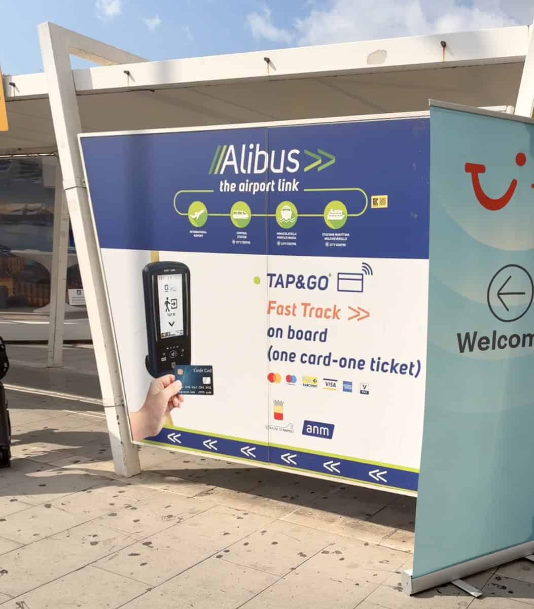 AliBus transfer sign at Italian airport with TAP&GO fast track info.